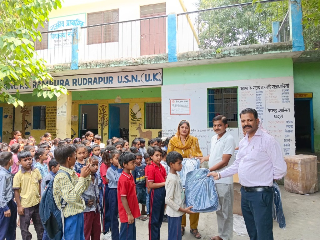 Distribution of school bags at Government Primary School, Rampura